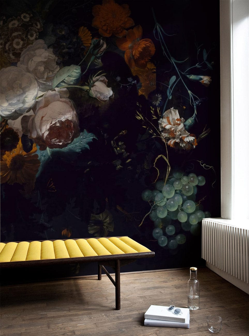 Dark floral mural wallpaper, rich vintage hues, yellow bench, dark wood flooring, bright natural light.