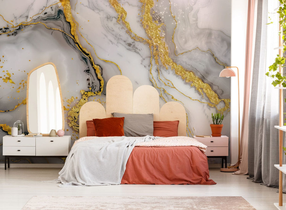 Luxury gold marble effect wallpaper in modern bedroom with elegant grey swirls, stylish white furniture.
