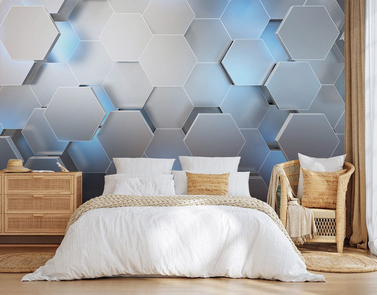 Modern hexagonal silver and blue wallpaper in bedroom with wicker chair, wooden furniture, simple decor.