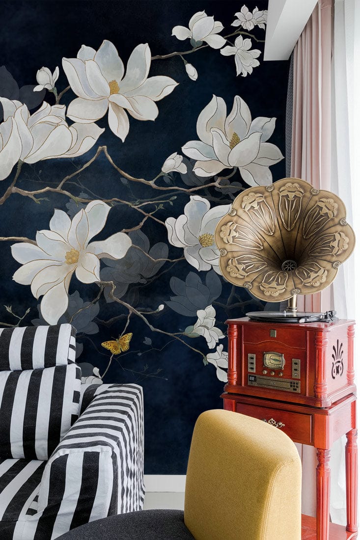 Elegant White Magnolia Mural on Midnight Blue Wall, featuring striped sofa and vintage phonograph.