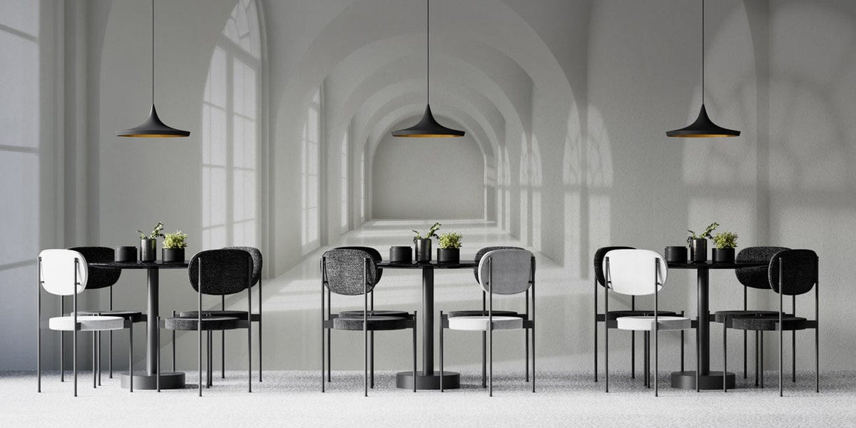 Elegant white arched hallway wallpaper, modern dining room with black chairs, pendant lights, grey carpet flooring.