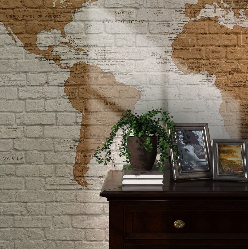 Vintage Brick World Map Mural Wallpaper with rustic brown-white design, wooden sideboard, detailed world map.