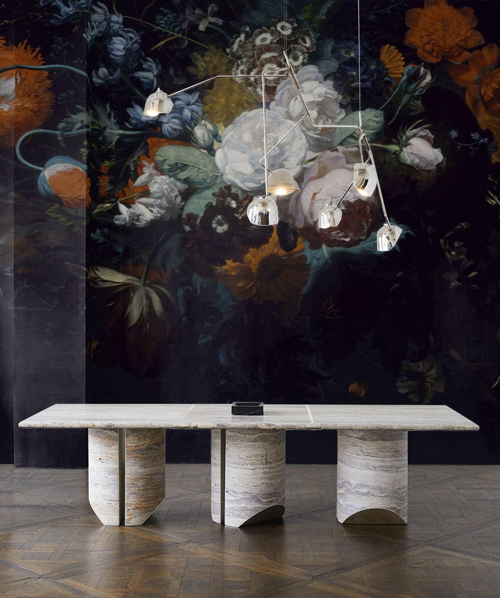 Spécialé Interieur vintage floral wallpaper, elegant pendant light, modern stone table, wooden parquet flooring.