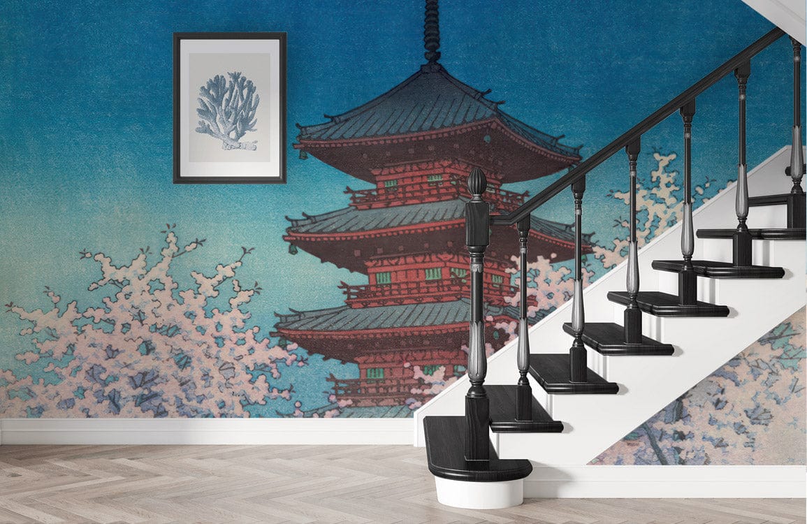 Serene Japanese Pagoda wallpaper in staircase with hardwood flooring and framed artwork on blue wall.
