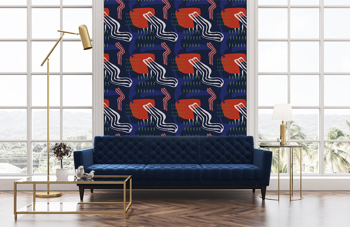 Contemporary geometric wallpaper in living room, navy sofa, wooden flooring, large windows, gold lamp.