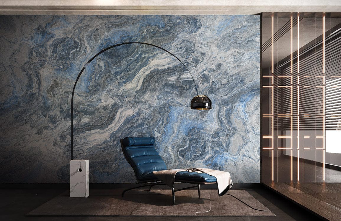 Elegant blue-grey marble effect wallpaper in modern living room, featuring leather recliner and floor lamp.
