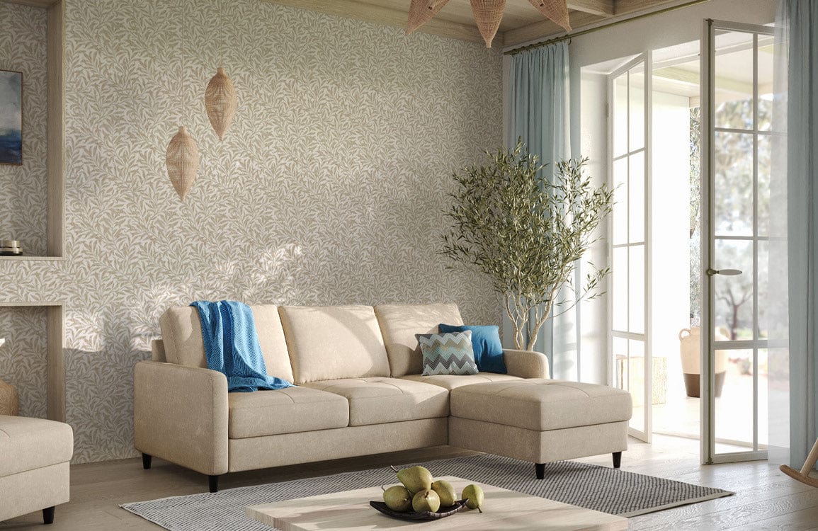 Cream botanical leaf pattern wallpaper in elegant living room with beige sofa, blue accents, glass doors.
