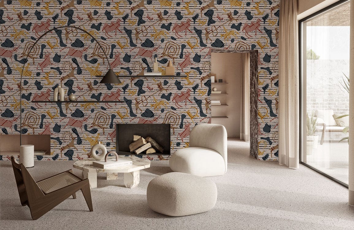 Abstract geometric multi-coloured wallpaper in modern living room with stylish grey furniture and terrazzo flooring.
