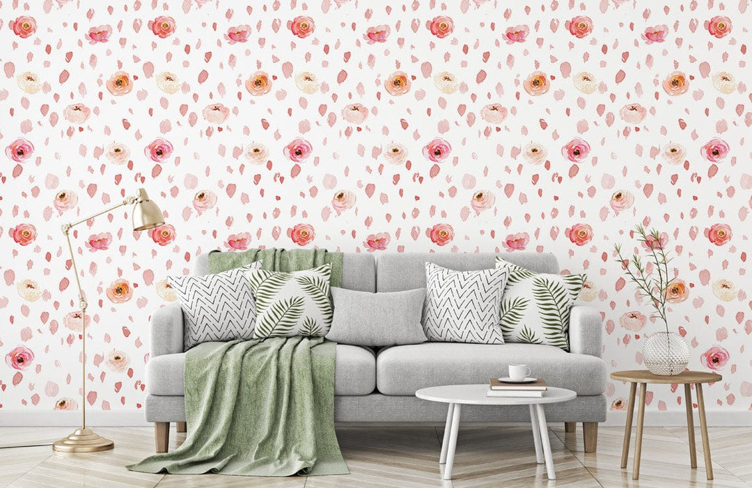 Delicate pink rose floral watercolour pattern wallpaper, grey sofa, chevron cushions, modern living room.