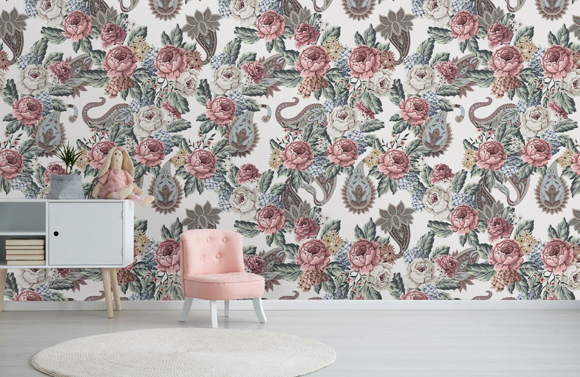 Vintage floral wallpaper with pink roses, green foliage, pink chair, white cabinet, kids' room.