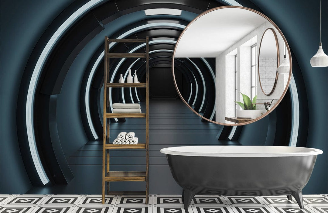 Futuristic blue tunnel mural in modern bathroom with black freestanding bathtub, geometric floor tiles.