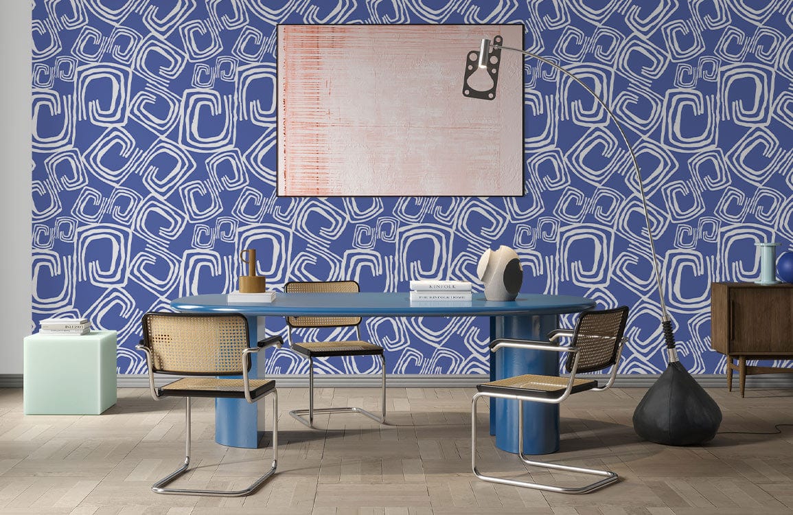 Abstract Blue Geometric Pattern Wallpaper with modern dining room, blue table, rattan chairs, and artwork.