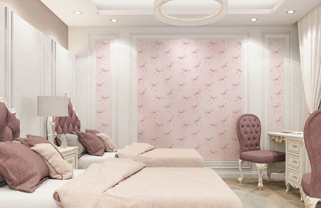 Charming pink bow wallpaper in elegant bedroom with cream furniture, cosy twin beds, and vintage decor.