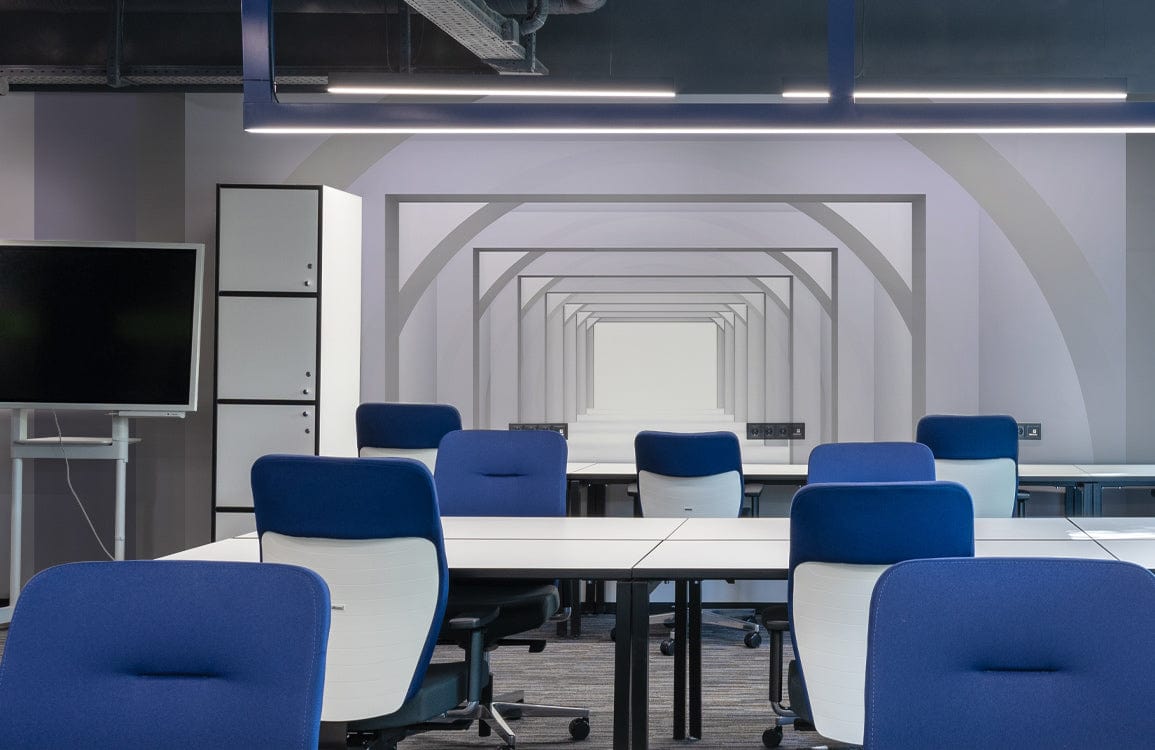 Modern grey architectural illusion wallpaper, minimalist office room, blue chairs, white tables, contemporary design.
