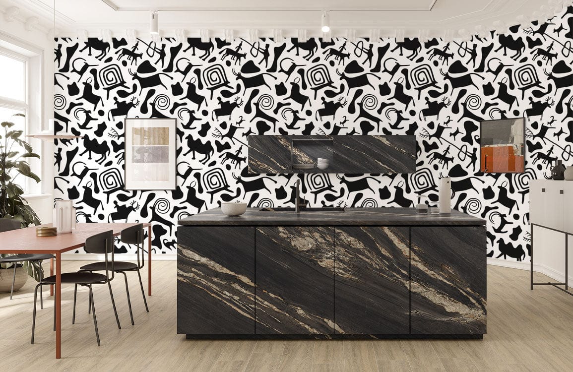 Monochrome tribal abstract pattern mural wallpaper in modern kitchen with marble island and wood flooring.