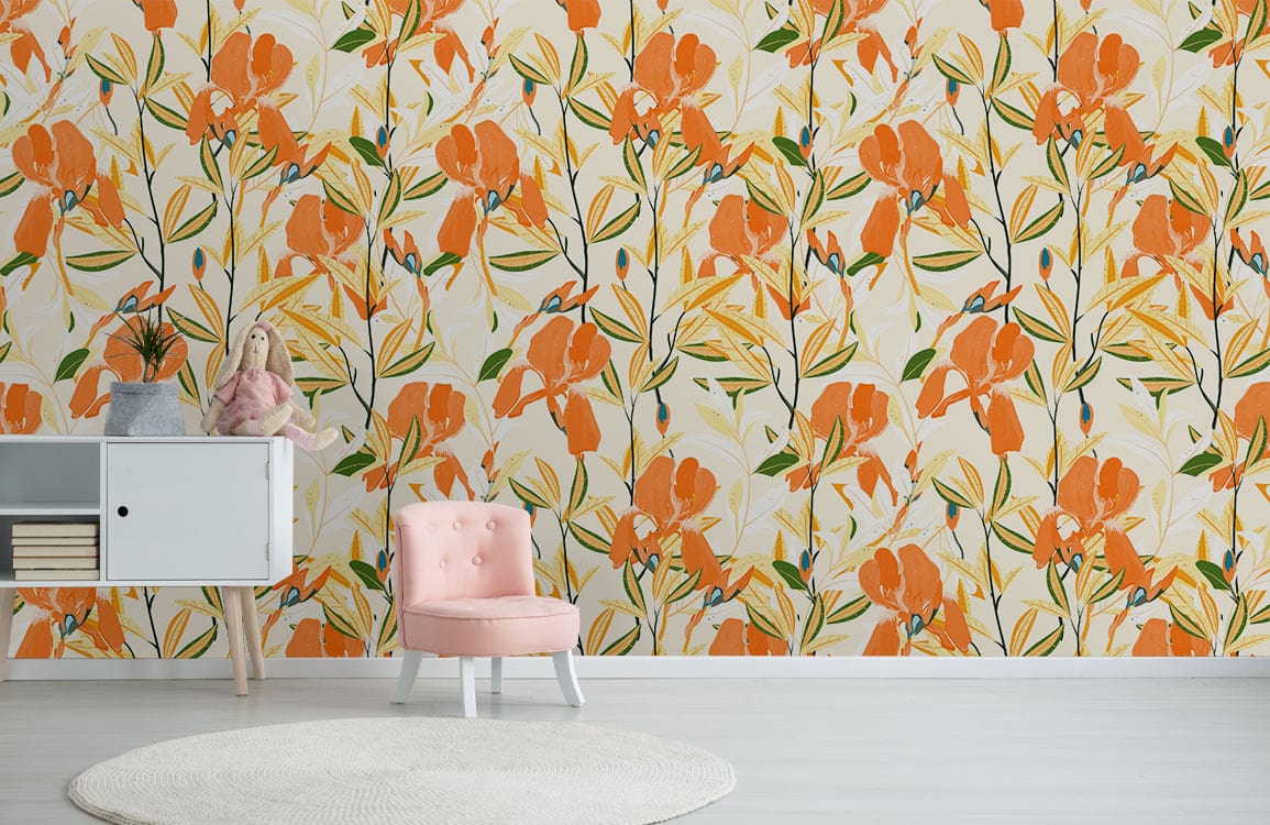 Orange floral wallpaper, pink chair, white cabinet, light wooden flooring, stylish living room decor.