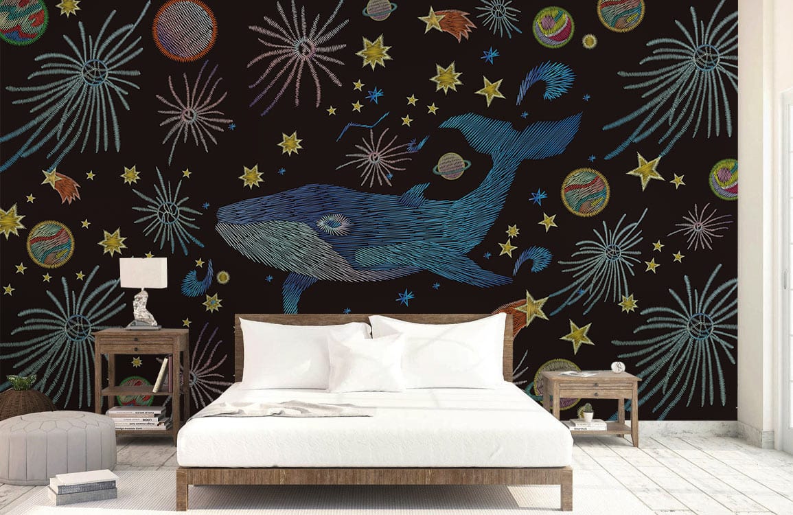 Cosmic Whale Adventure Mural Wallpaper on dark wall, light wood furniture, white bedding, light wood flooring.