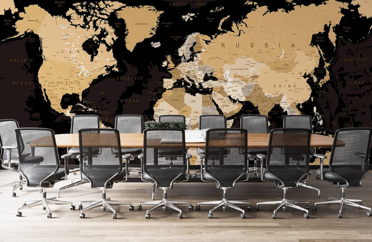 Vintage world map mural wallpaper in office with grey chairs, wooden table, and light wood flooring.