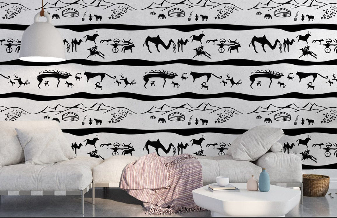 Black and White Tribal Animal Print Wallpaper in lounge with neutral sofa, industrial flooring, pendant light.