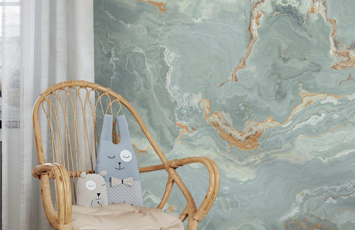 Marble effect sage and rust wallpaper with rattan chair in cosy room, complementing abstract design.