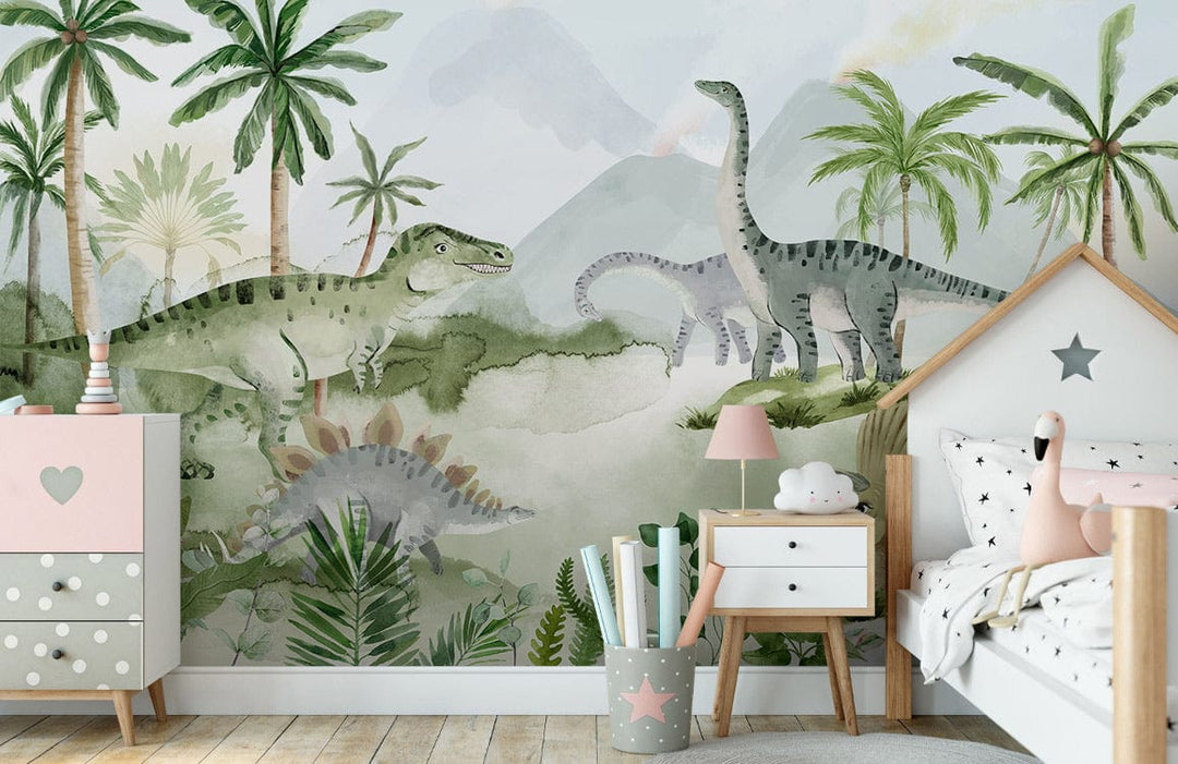 Jungle Dinosaur Adventure mural with green watercolour, white frame bed, pink drawers, wooden flooring.