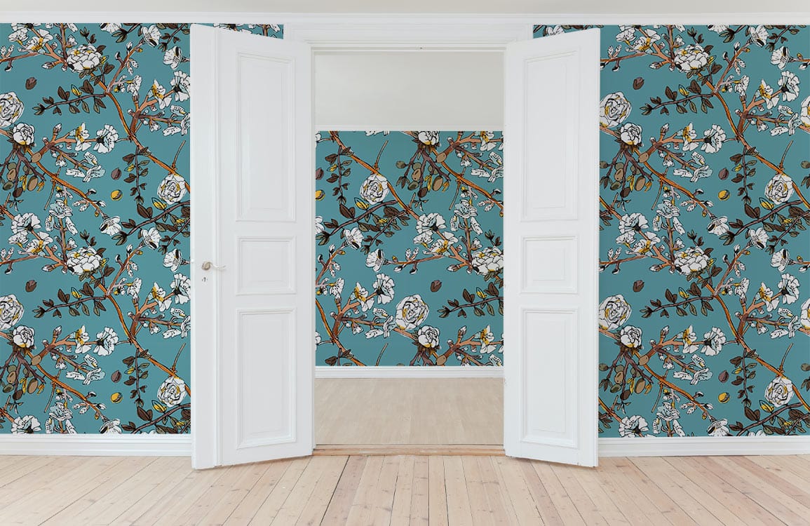 Elegant teal floral wallpaper with white roses, visible through white double doors over wooden flooring.