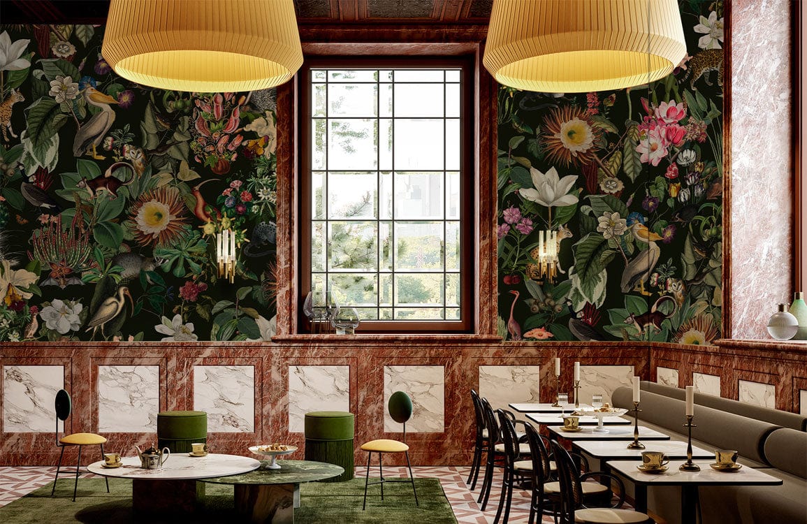 Tropical Jungle Paradise Floral Mural Wallpaper in luxurious dining room with marble walls, plush seating.