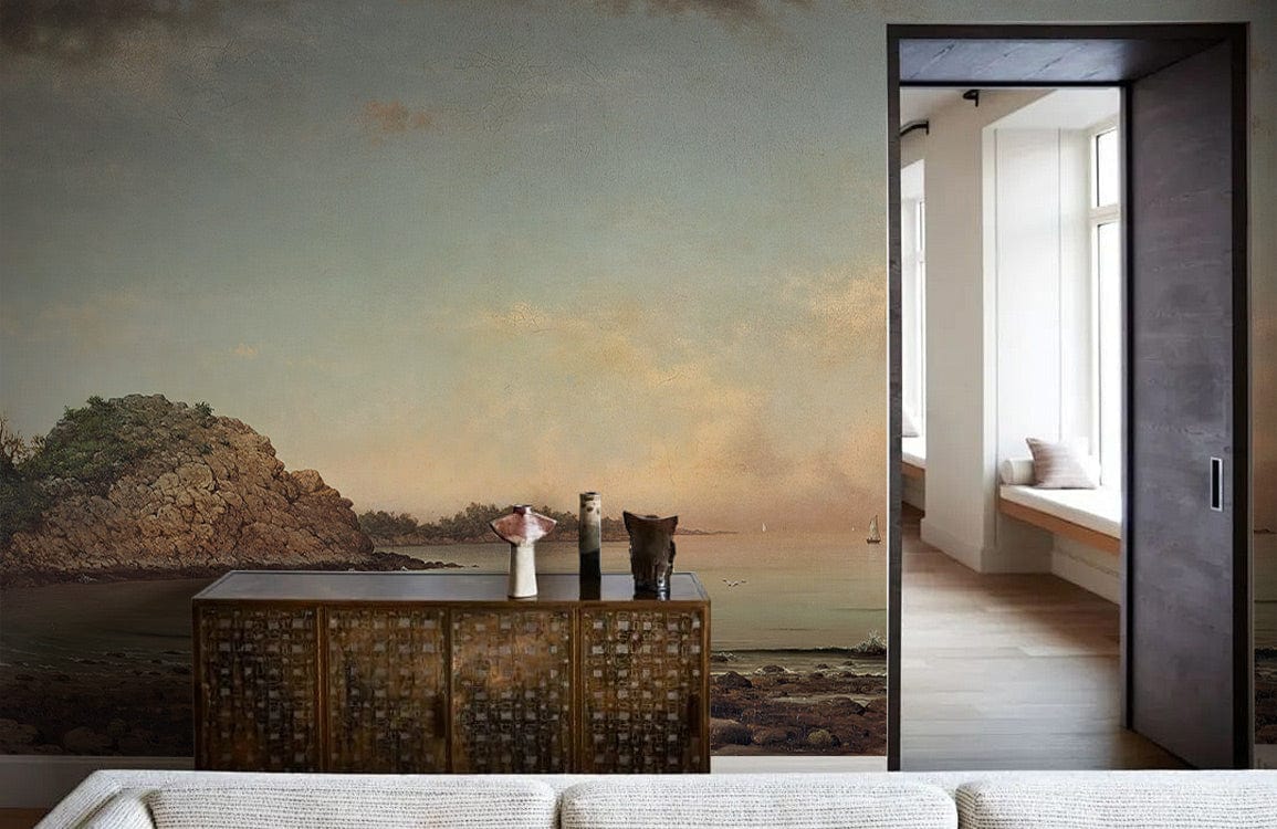 Tranquil coastal mural with pastel hues adorns living room; features textured cabinet, neutral sofa.