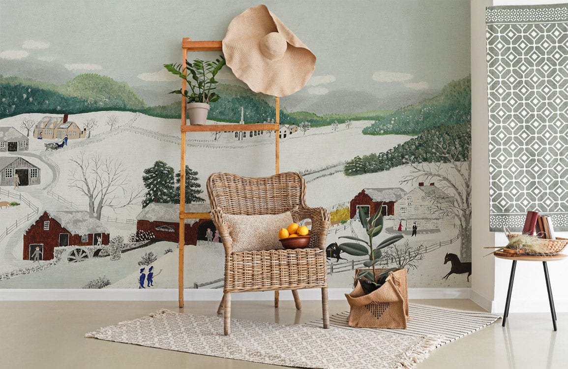 Rustic Winter Wonderland Mural Wallpaper in living room with wicker chair, beige rug, snowy scenery.