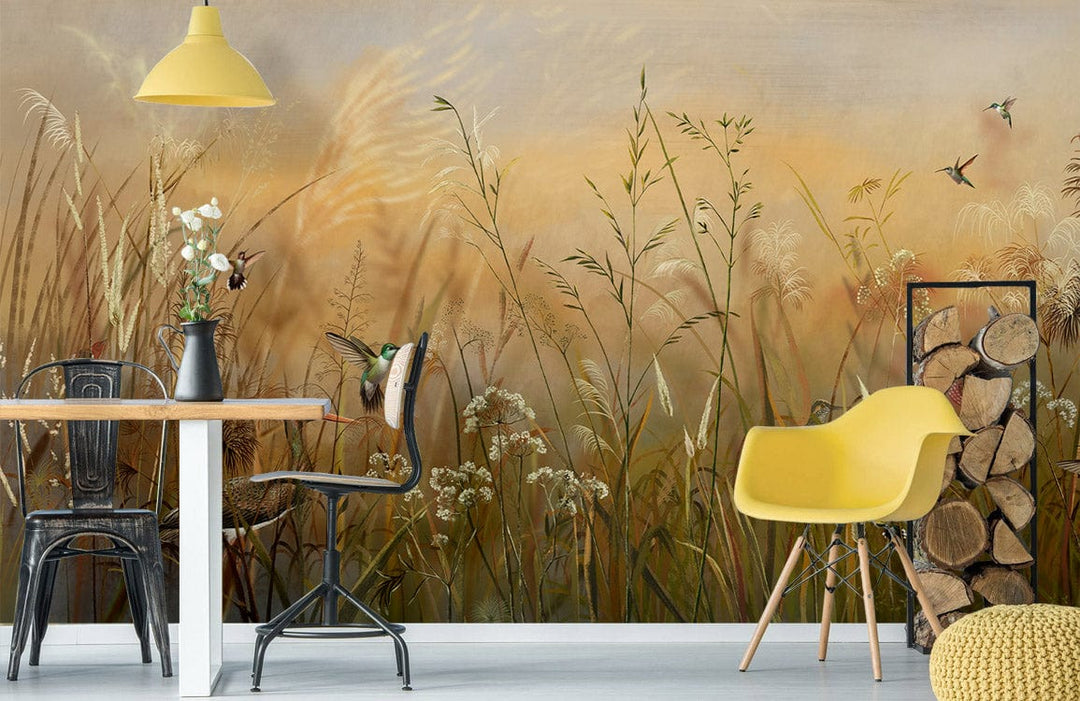 Vintage autumn meadow mural wallpaper featuring birds; warm earth tones complement yellow chair, industrial dining.