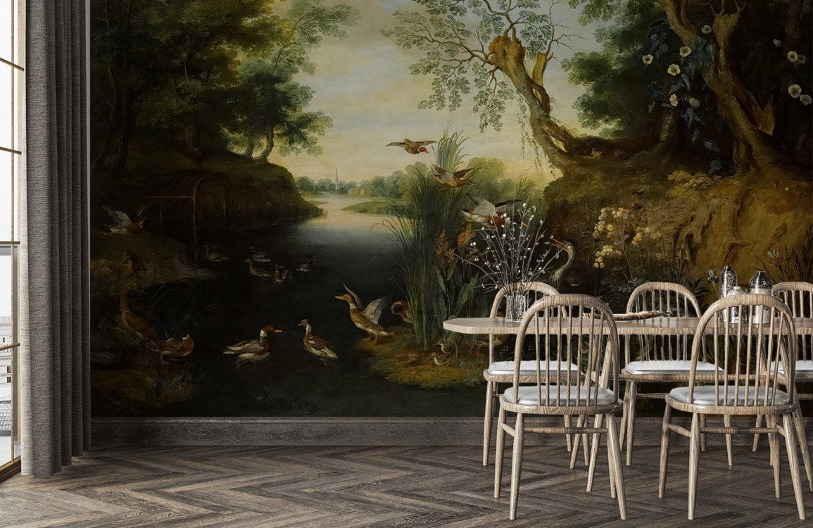 Vintage mural wallpaper with lake and birds in a dining room, wooden chairs, herringbone flooring.