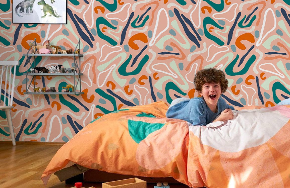 Modern art wallpaper in terracotta and teal; children's bedroom with playful decor and vibrant bedding.