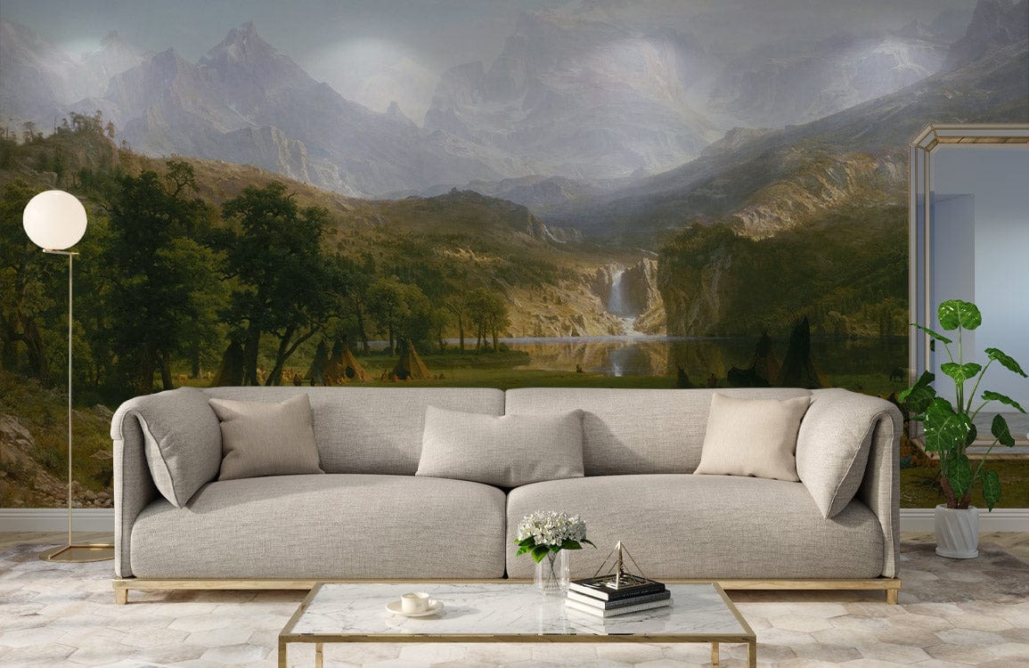 Grey sofa with Majestic Mountain Vista Landscape Mural Wallpaper, serene nature art, light wood flooring.