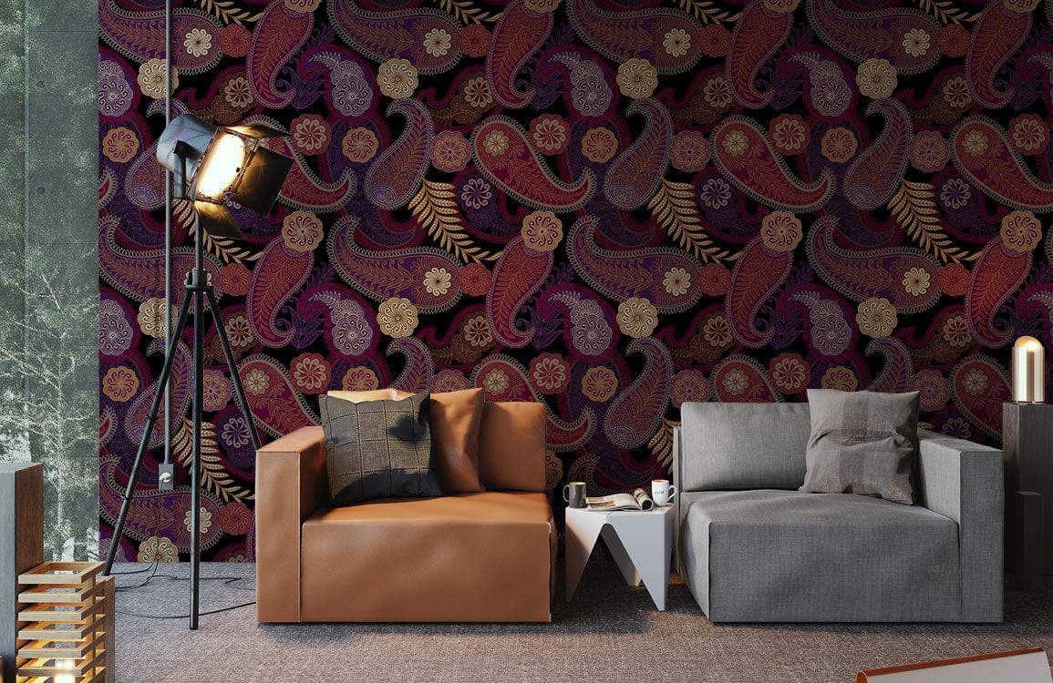 Vintage paisley pattern wallpaper in rich red and gold, brown leather sofa, grey sofa, carpet flooring.