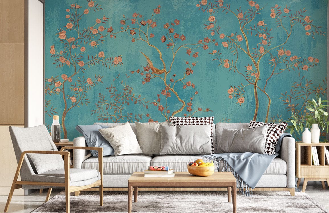 Elegant turquoise floral mural wallpaper with birds, pink blossoms; grey sofa, wooden furniture in modern living room.