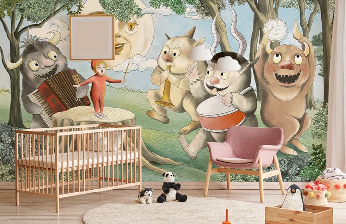 Whimsical forest creatures mural wallpaper in nursery with wooden cot and pink chair on wooden flooring.