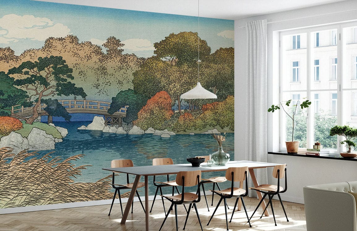 Serene Autumn Landscape Mural Wallpaper in dining room with wooden chairs, modern table, pendant light.