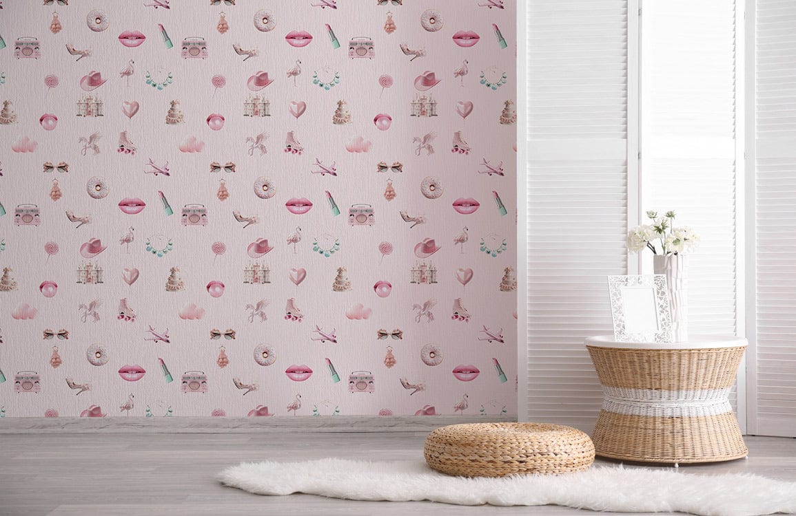 Chic pink vintage patterned wallpaper; wicker table, rug, pouffe, and white panel wall in living room.