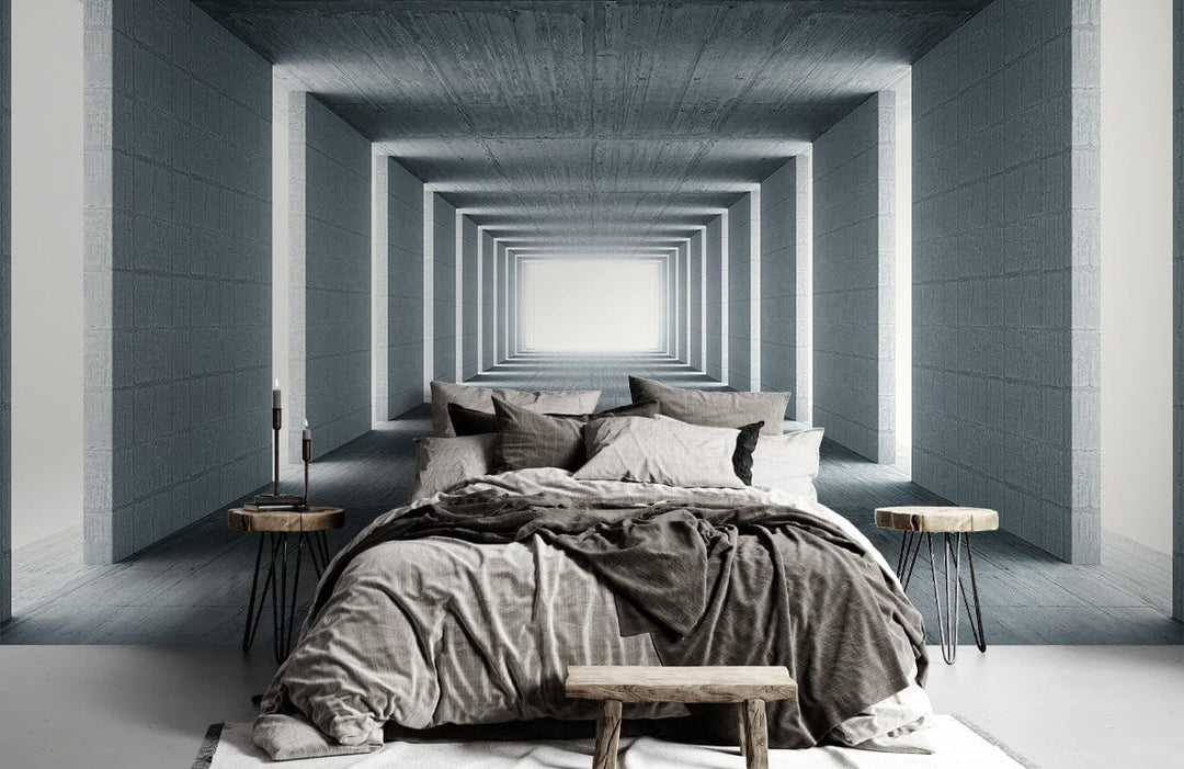 Abstract grey tunnel mural wallpaper in modern bedroom, featuring cosy grey bedding and rustic wooden stools.