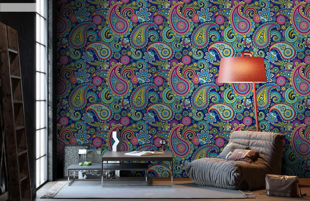 Vibrant paisley wallpaper, bohemian style, colourful floral accents, grey sofa, modern floor lamp, living room.