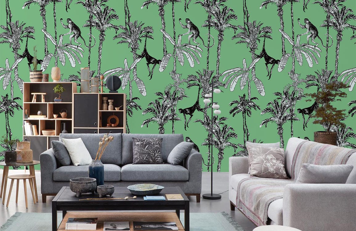 Grey sofas in a living room with Tropical Jungle Art Deco Green Wallpaper, playful monkeys and palms.