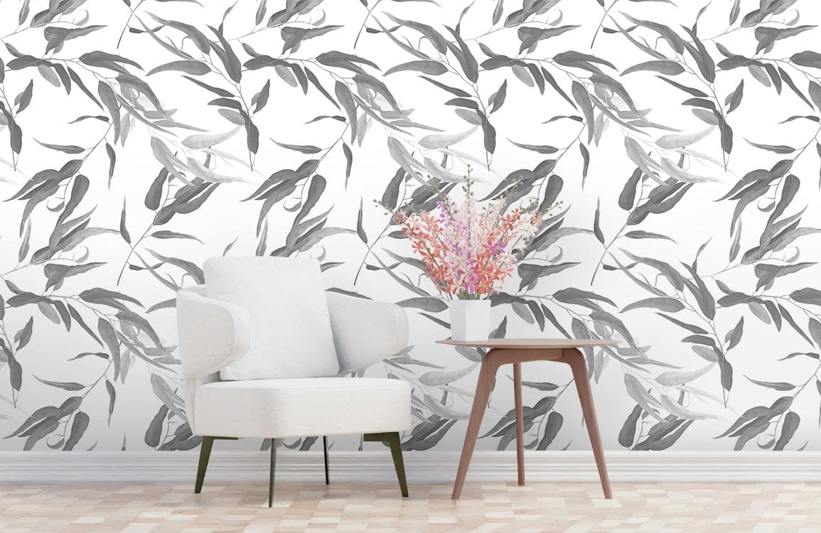 Elegant grey botanical leaf wallpaper, minimalist design, white armchair, wooden floor, modern living room.