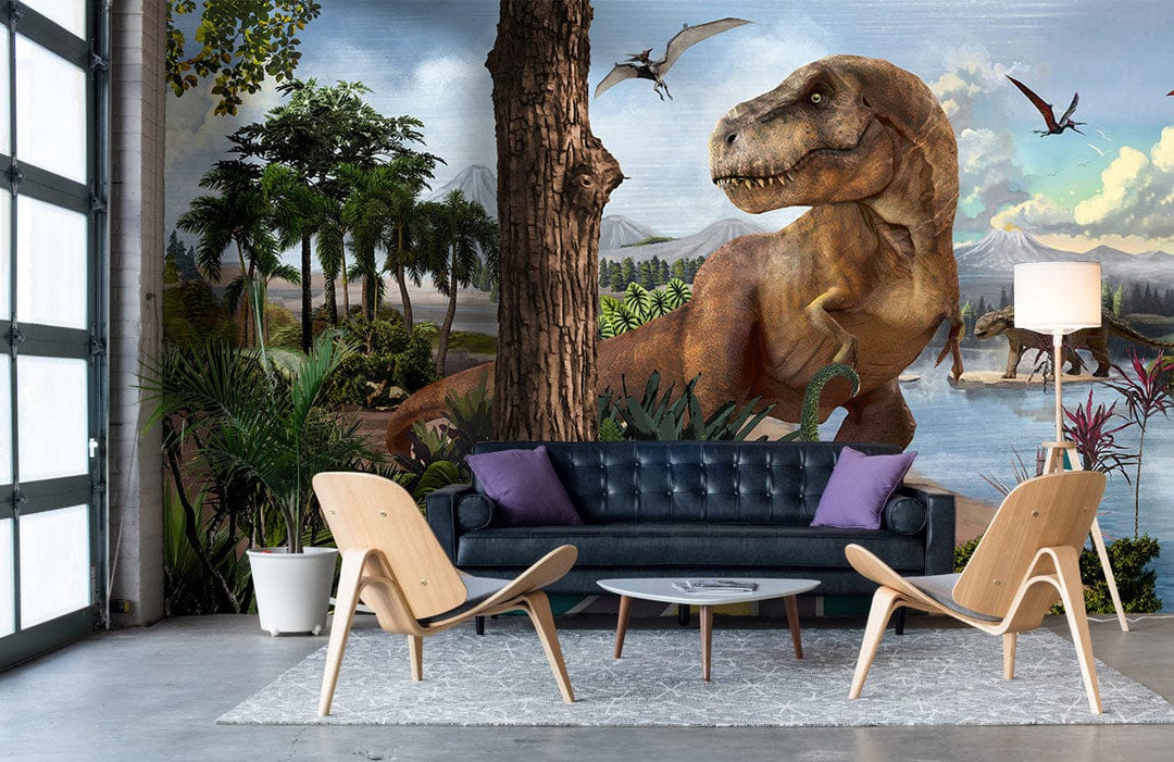 Alt text: Colourful dinosaur mural wallpaper in living room with black sofa, wooden chairs, grey rug.