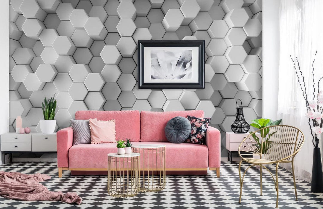 Modern grey hexagonal 3D wallpaper in stylish living room with pink sofa, geometric flooring, decor.