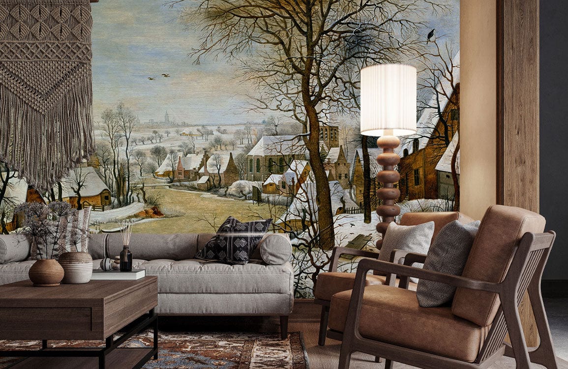 Vintage winter village mural wallpaper, beige sofa, brown armchair, wooden table, living room setting.