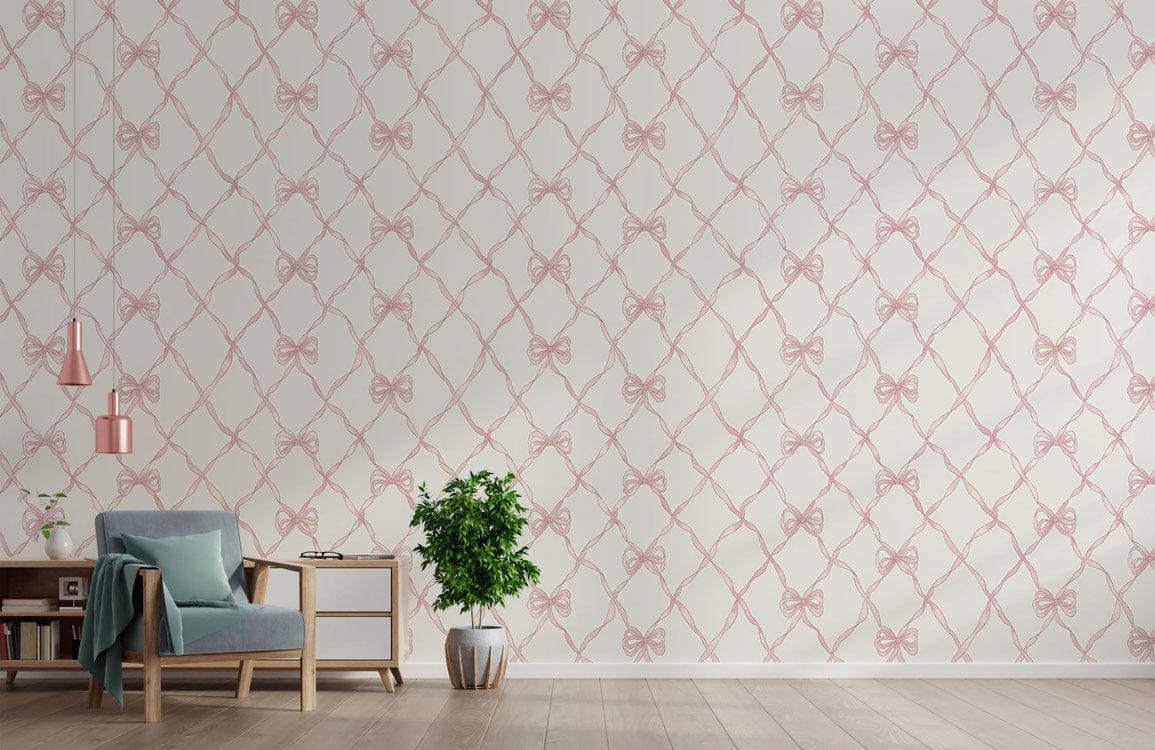 Elegant pink bow wallpaper, classic British style; wooden flooring, grey armchair, green plant, modern decor.