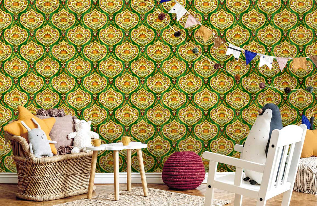 Luxurious green and gold wallpaper; wicker sofa, white chairs, wooden floor in a cosy living room.