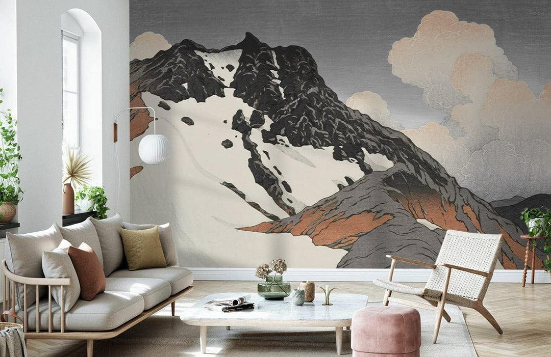 Vintage Mountain Landscape Mural Wallpaper in living room with grey sofa, light wood flooring, Scandinavian style.