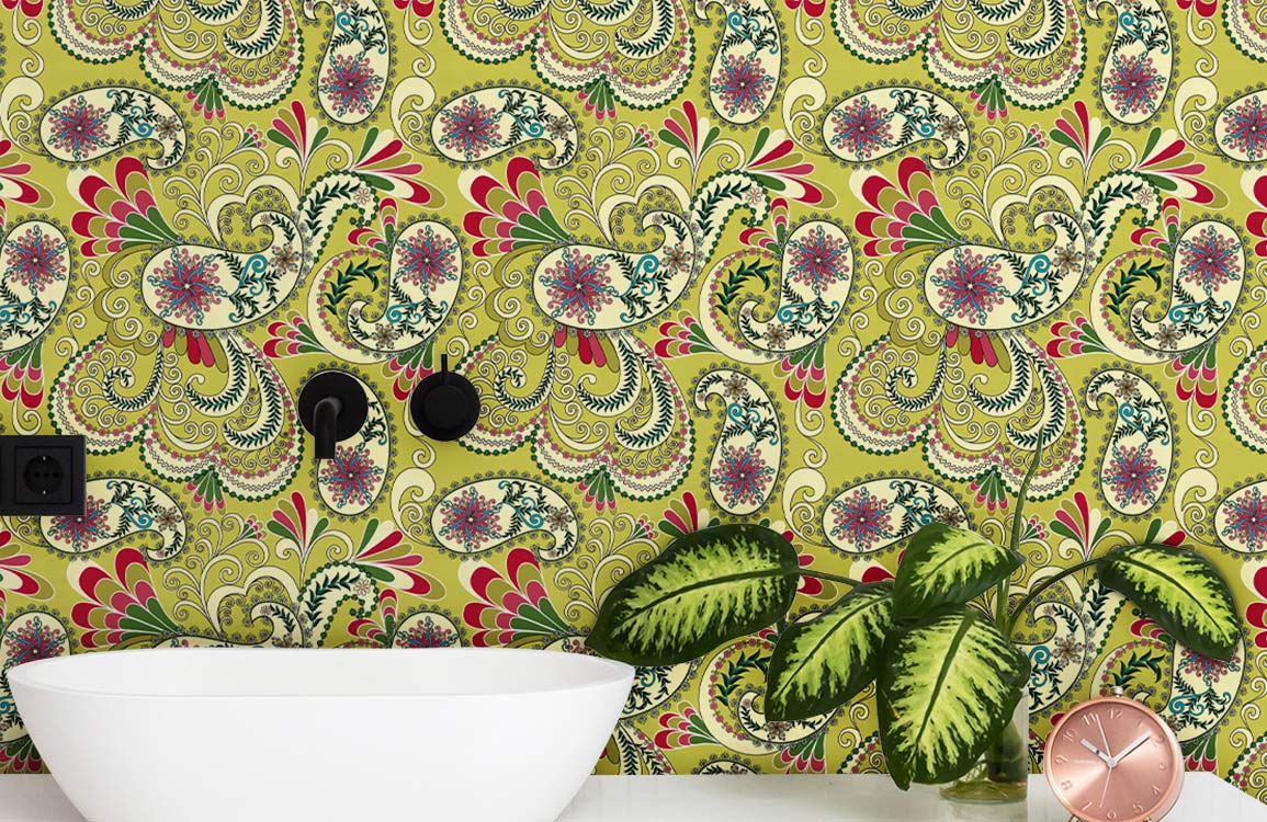 Vintage Floral Paisley Wallpaper in green, red, white basin, vibrant bathroom decor, leafy plants, clock.