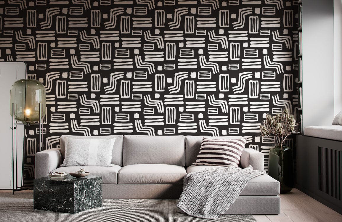 Grey sofa with Monochrome Geometric Tribal Pattern Wallpaper; black marble coffee table and floor lamp.